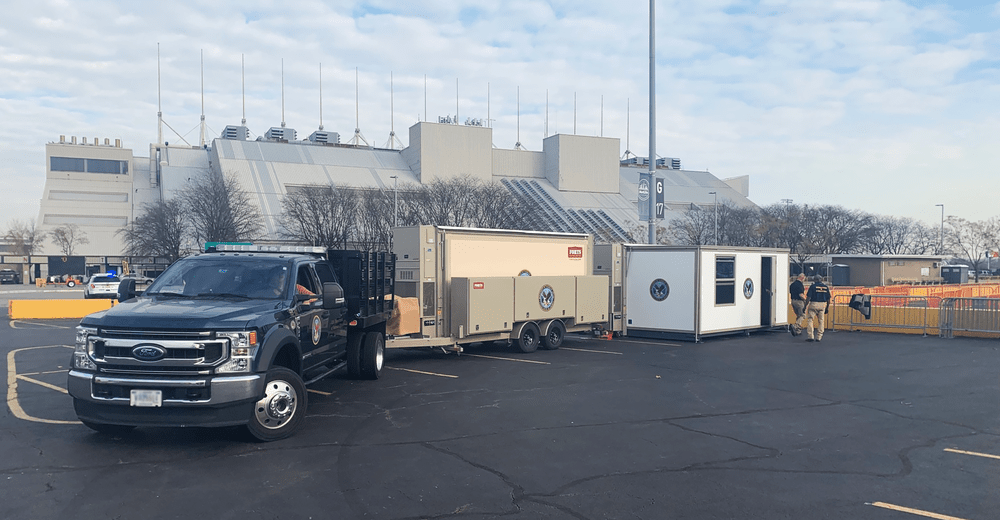 FORTS 38 on a Mobilizer trailer beside a deployed shelter at a field operation